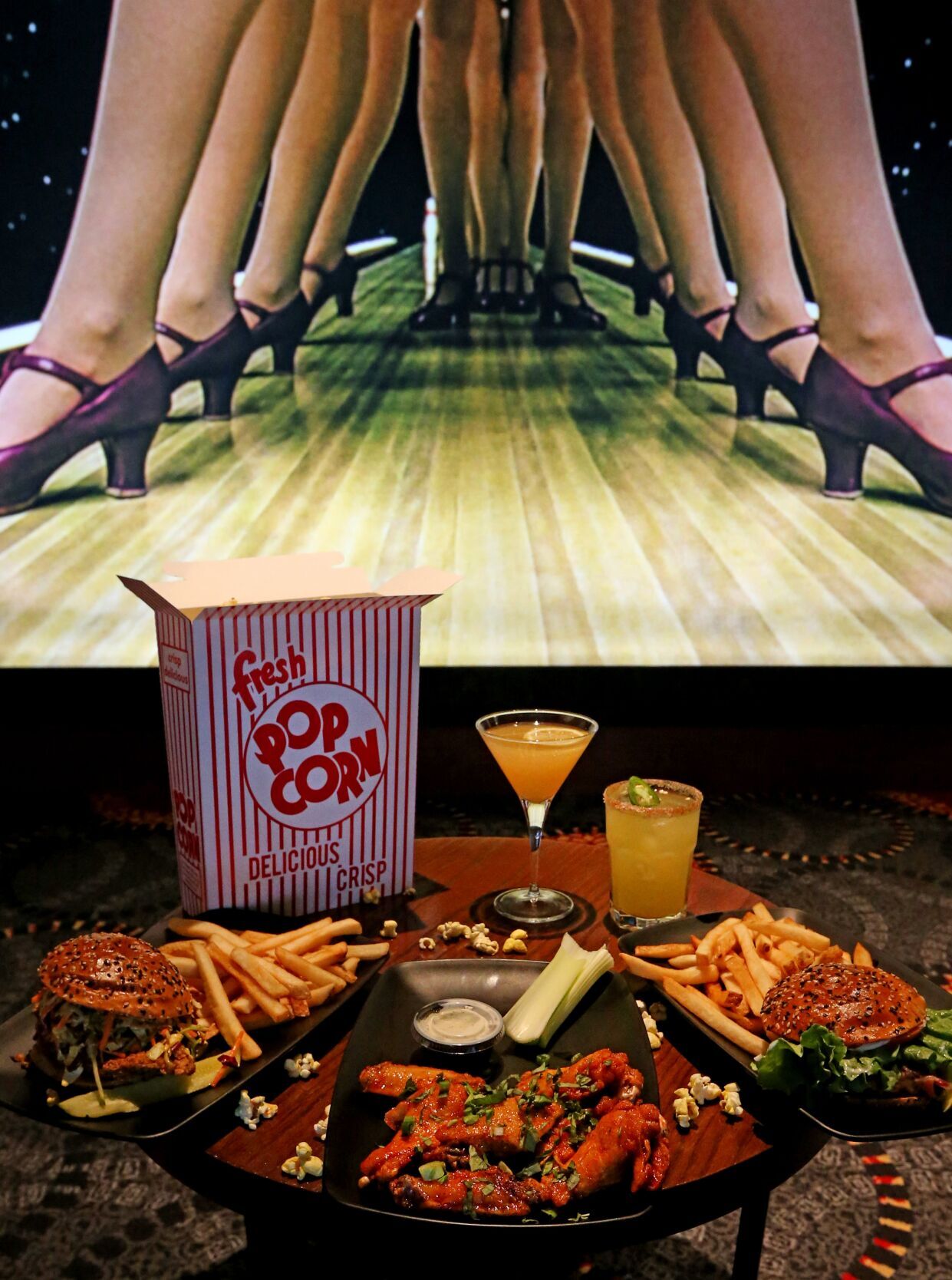 Alamo Drafthouse - a theater featuring creative cocktails and bits seat-side